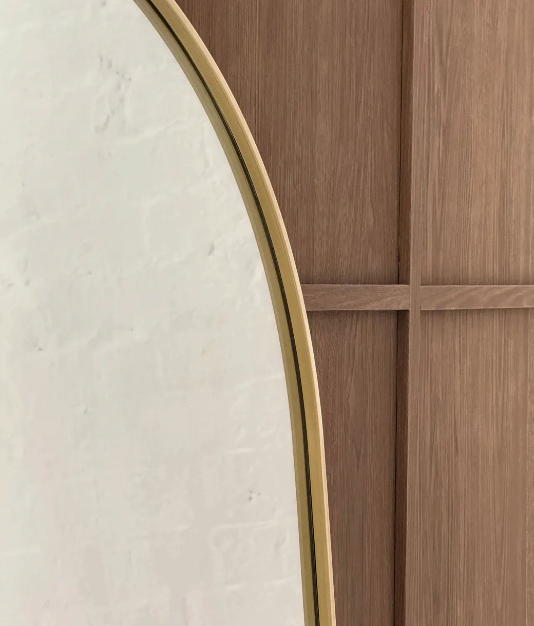 Close up of Gold Arched Mirror